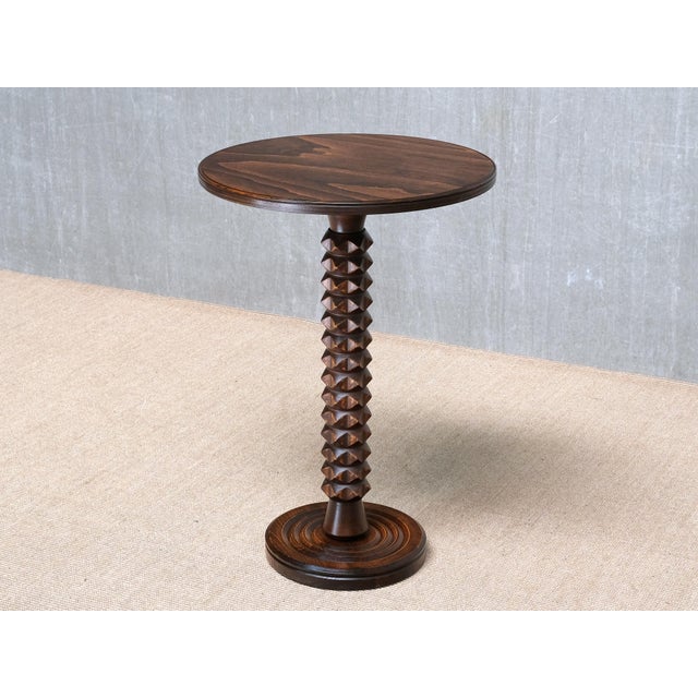 This sculptural side table was designed by Charles Dudouyt and produced in France in the mid-20th century. The piece...
