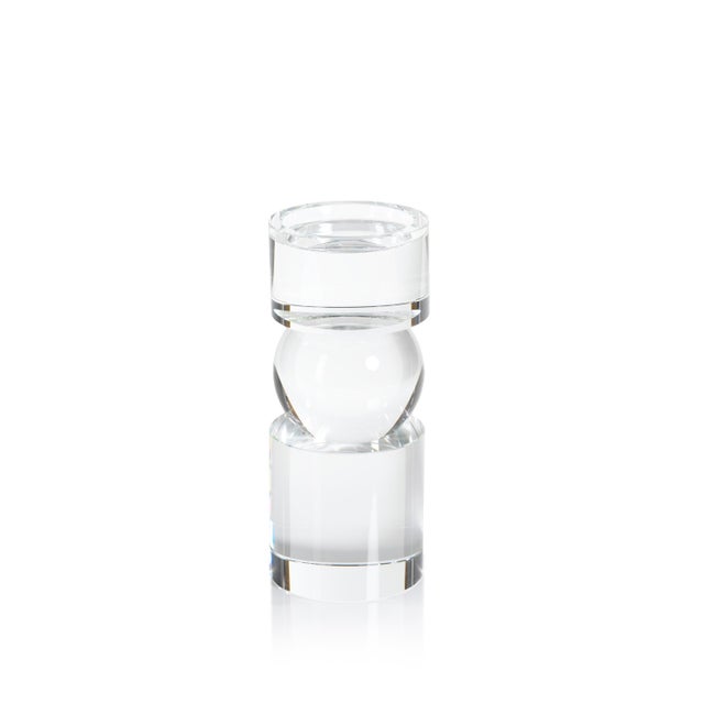 There’s nothing like moody candlelight reflecting in clear faceted crystal to create a sophisticated setting. Our Renata...