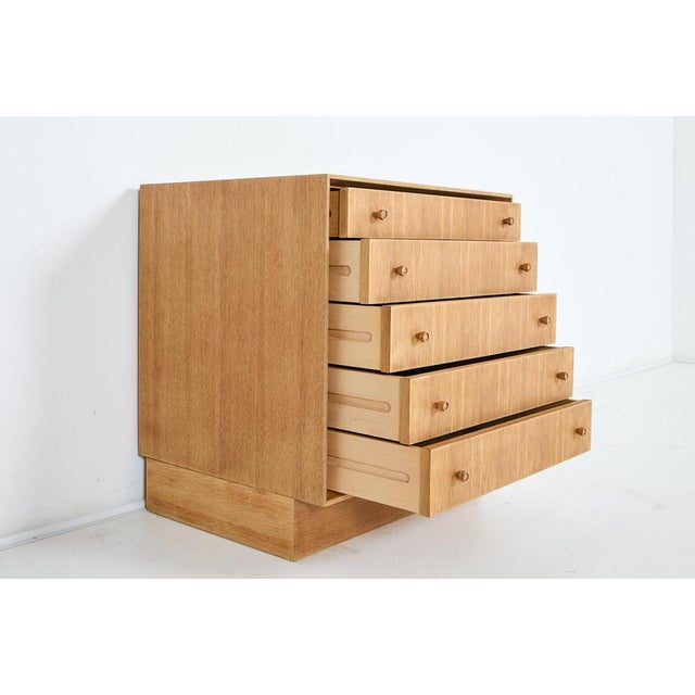 Beautiful small chest of drawers in varnished oak veneer produced in 1970s Denmark. Condition Good, age related wear and...