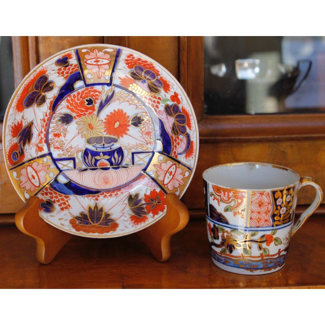 A pattern #240 gilt Imari saucer of exquisite detail put together with a coordinating Spode pattern #310, the “Rock and...