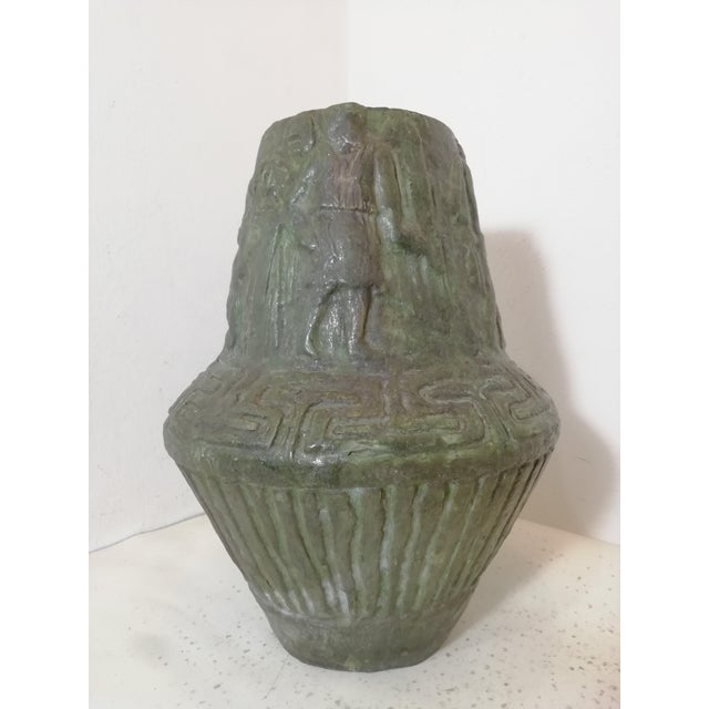 Unique handcrafted and painted ceramic vase. Strikingly flared modernist shapes. Featuring a geometric line decoration on...