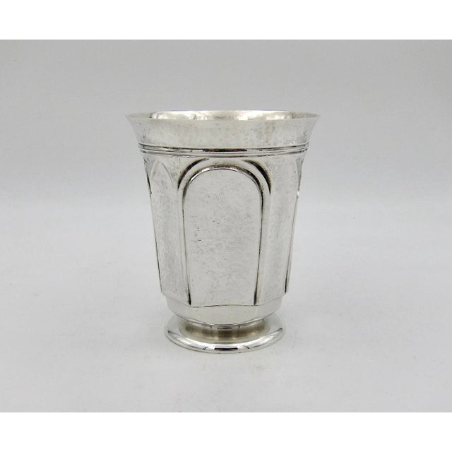 An antique sterling silver tumbler from the Arts & Crafts period by Marie Zimmermann (1879-1972), a noted American...