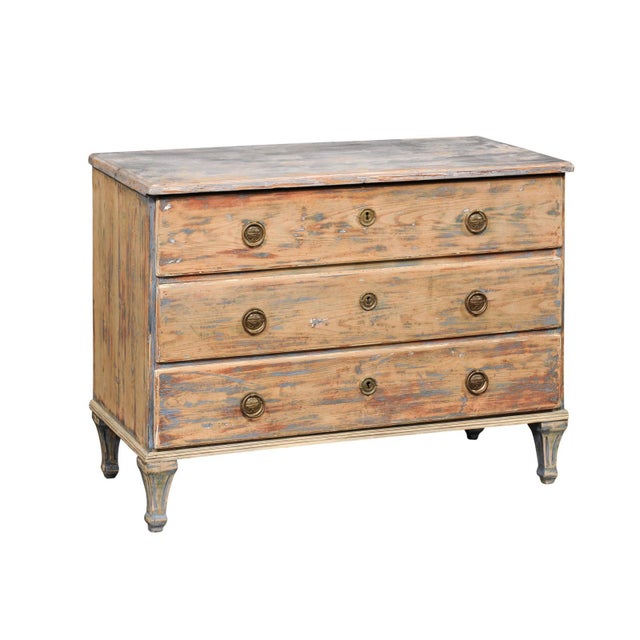 A Swedish Gustavian style chest of three drawers from the 19th century. This antique chest from Sweden has been designed...