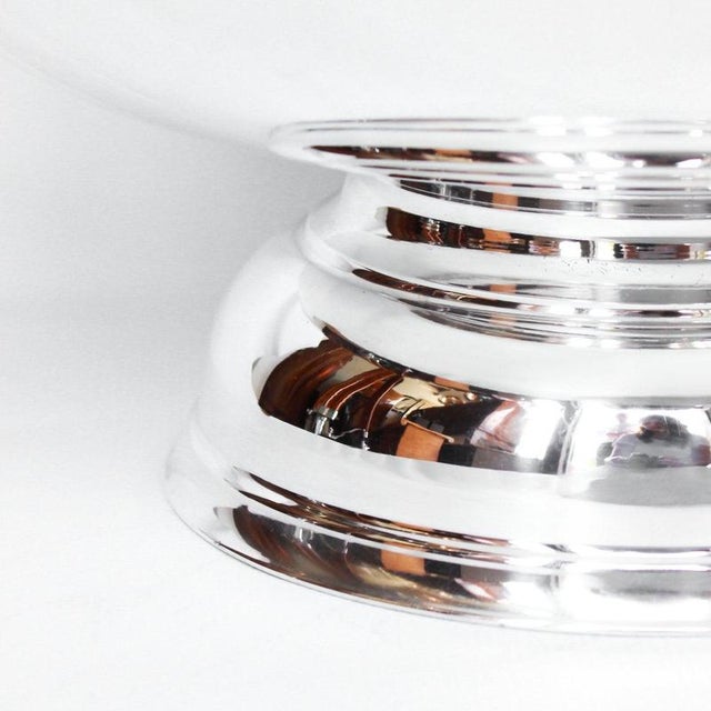 A large, silver plated champagne bowl of recent manufacture with raised detail to side. Dimensions: H 25cm, Diameter 37cm...