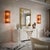 A captivating orange hue defines this Murano glass wall lamp, featuring a captivating, elongated design and a splendid...