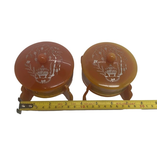 Early 20th Century Art Deco Cinnamon Brown Bakelite Round Footed Boudoir Lidded Powder Jars With Asian Grapevine Design - a Pair For Sale - Image 10 of 13