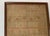 Antique Needlework Sampler. Nice old antique condition Appears to be in original frame. Marked on the back with what I...