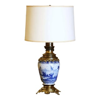 19th Century French Delft Blue and White Faience Oil Lamp With Brass Mounts For Sale
