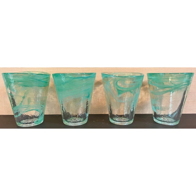 Beautiful set of four authentic Kosta Boda "Mine" Tumblers designed by renowned Swedish artist Ulrica Hydman Vallien...