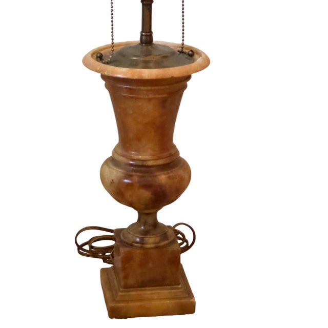 Italian amber colored alabaster vase now as a lamp. No shade or finial.