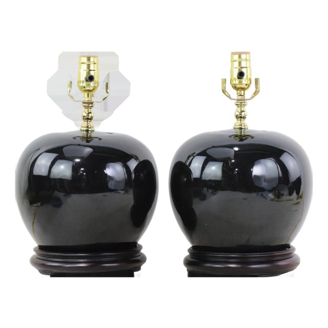 Early 20th Century Black Monochrome Porcelain Watermelon Jar Table Lamps on Carved Wood Bases - a Pair For Sale