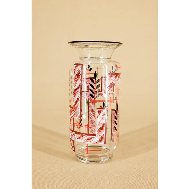 This is a unique hand-painted glass vase in Art Deco style. The piece has a beautiful simple colour combination.