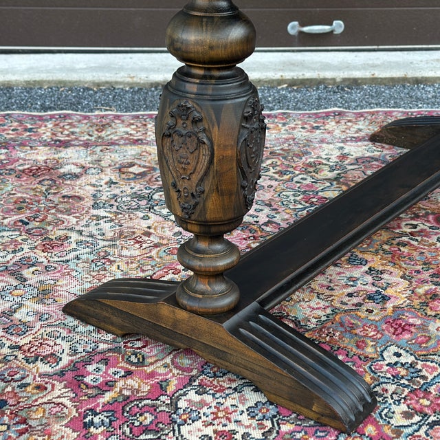 An antique multi-functional table circa early 20th century that could be used as a work table, writing desk or a console...