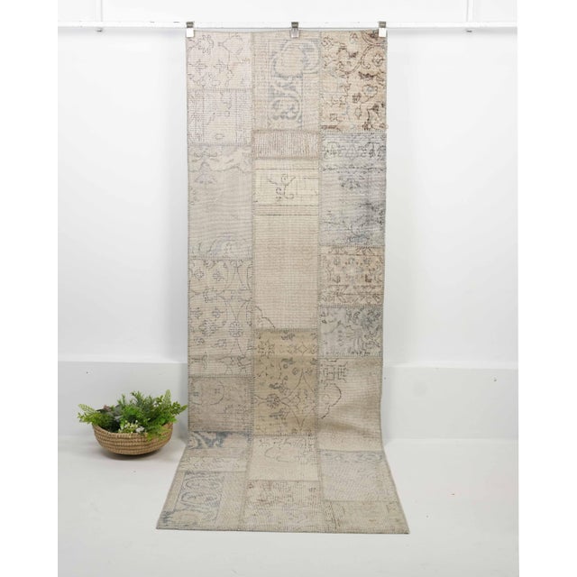 Vintage Turkish Hand-Knotted Patchwork Runner rug is a semi-antique vintage runner rug. The '70s Eastern region of...