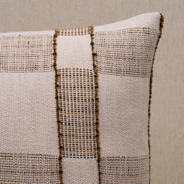 This pillow features Elko Plaid with a knife edge finish. The asymmetrical design and unexpected fringe detailing shows...
