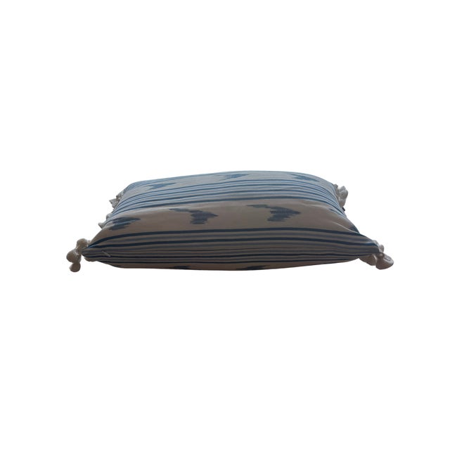 This pillow features Santa Barbara Ikat by Schumacher. A true warp-printed and woven ikat, this unique medium-scale stripe...