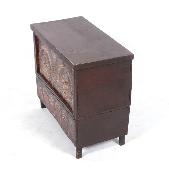 Moroccan hand painted wood chest, the front panels are hand painted with arabesques, raised up legs, from the 19th century.