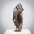 An expressive brutalist sculpture in welded iron, composed of sharply cut geometric elements that merge into a dynamic and...