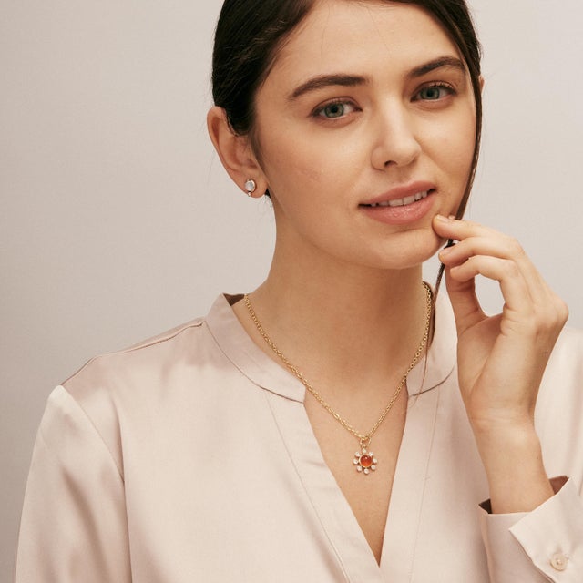 Created in 18kyg Orange chalcedony 2 carats approx. Diamonds 0.40 carat approx. Chain sold separately Limited edition...