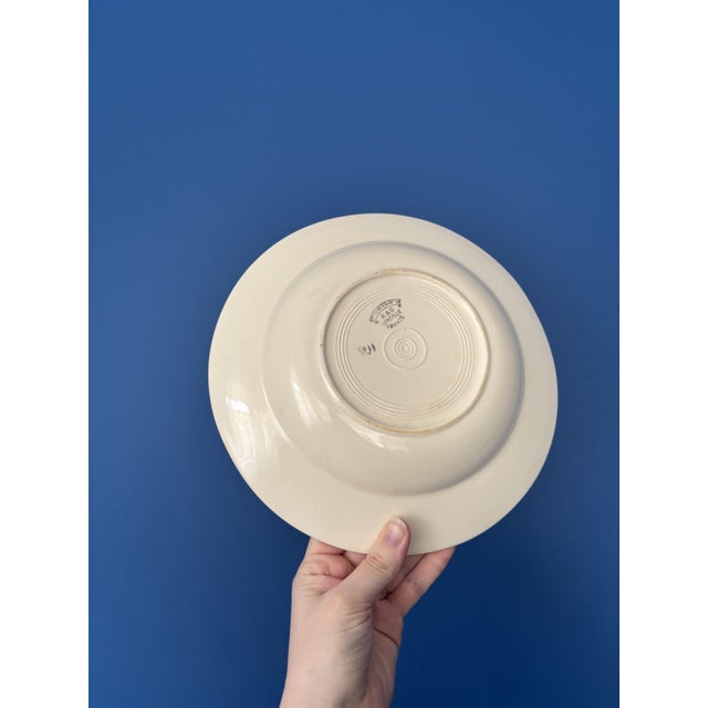 Charming set of 8 antique soup plates from the Lunéville factory, Odile pattern. These earthenware plates feature a...