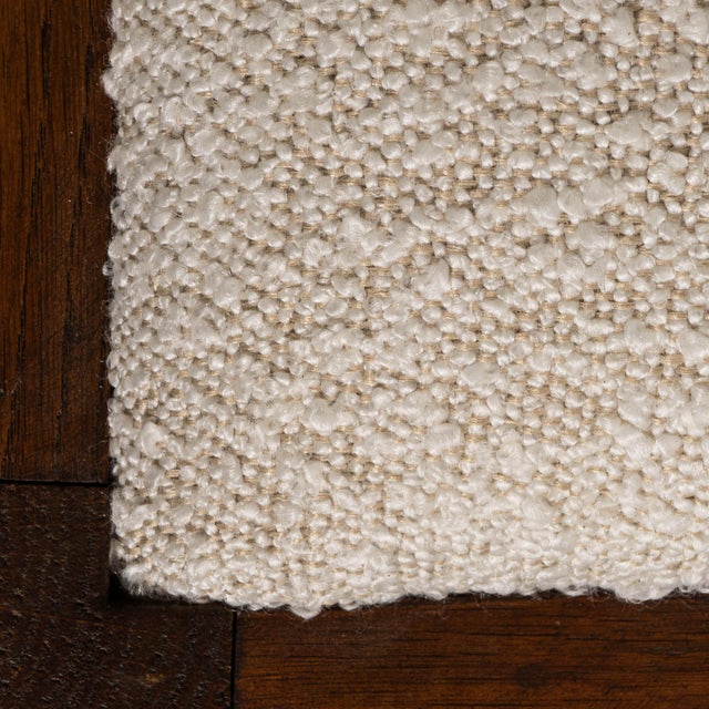 This set of six 1970s French oak Brutalist dining chairs presents a striking balance of sculptural form and honest...