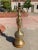 James Mont style tall brass and carved wood base table lamp manner of Marbro, manufactured in Japan, circa 1950s. Piece...