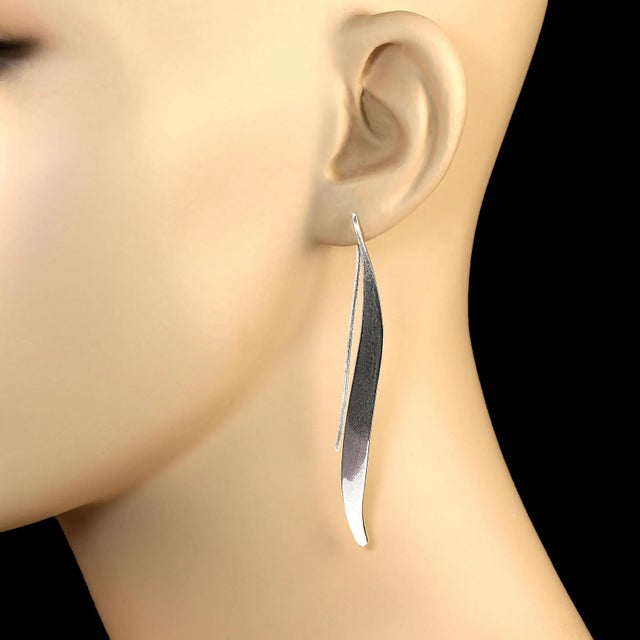 This is part of Chairish’s Costume Jewelry assortment. Elegant Long Sterling Silver Earrings – Handcrafted by Renowned...