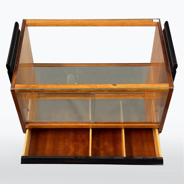 Of the period: 1950s, design:, Jindřich Halabala, manufacturer: UP Závody, material: stained beech wood, glass, This bar...