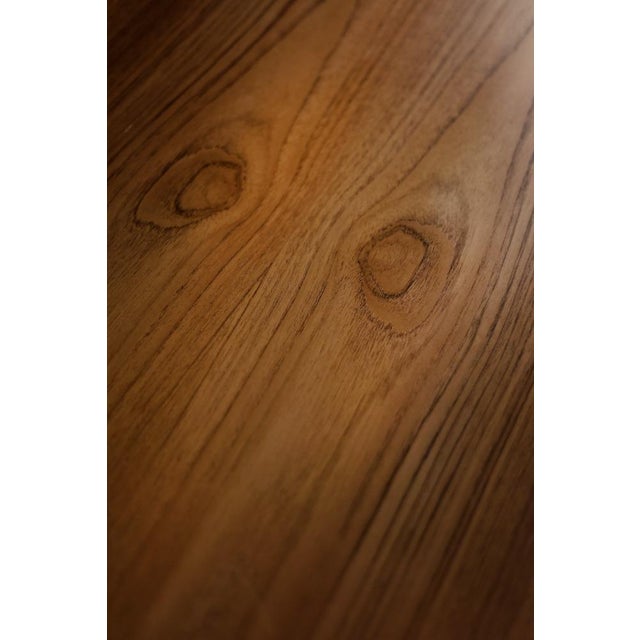 This classic desk was made in Denmark during the 1960s. It was finished of teak wood in a warm shade of brown, with...