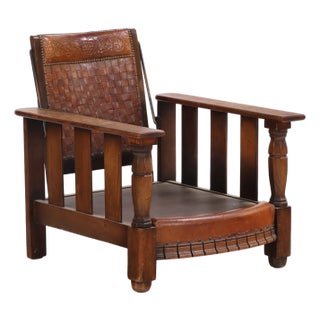 A French Oak and Leather Reclining Armchair, C. 1940. For Sale