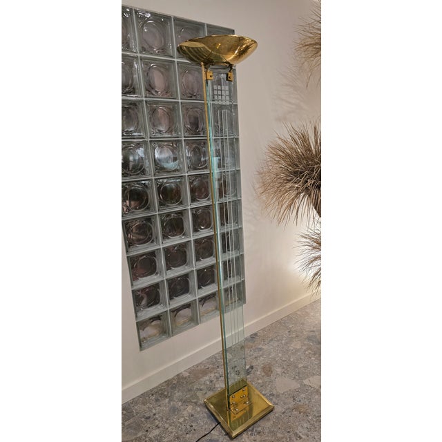 ▪️ 1980's Glass & Brass Torchiere Floor Lamp ▪️ Thick glass with geometric etching as main body ▪️ Brass base and top ▪️...