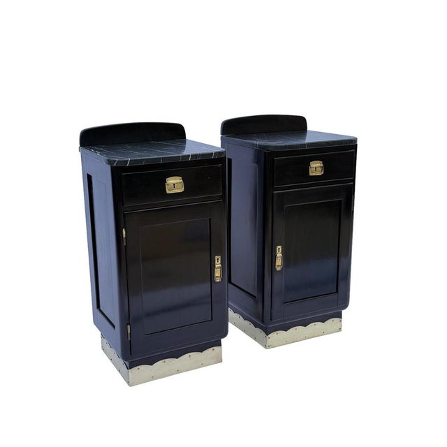 A refined pair of Art Deco nightstands, crafted in Vienna circa 1930s, distinguished by their elegant proportions and...