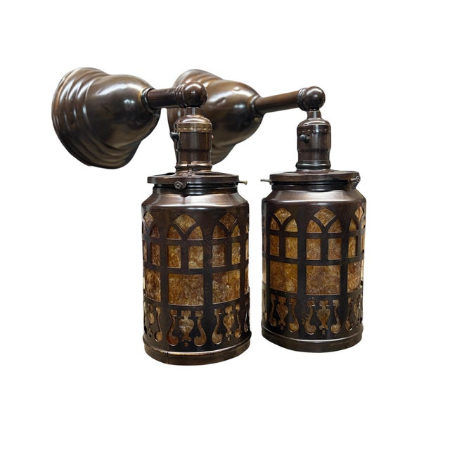 Pair solid brass sconces with new mica inside the lantern. Newly rewired and refinished with a dark brown patina. Original...
