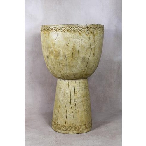 Introduce a touch of African elegance into your living space with this remarkable solid wood carved side table\.tool from...