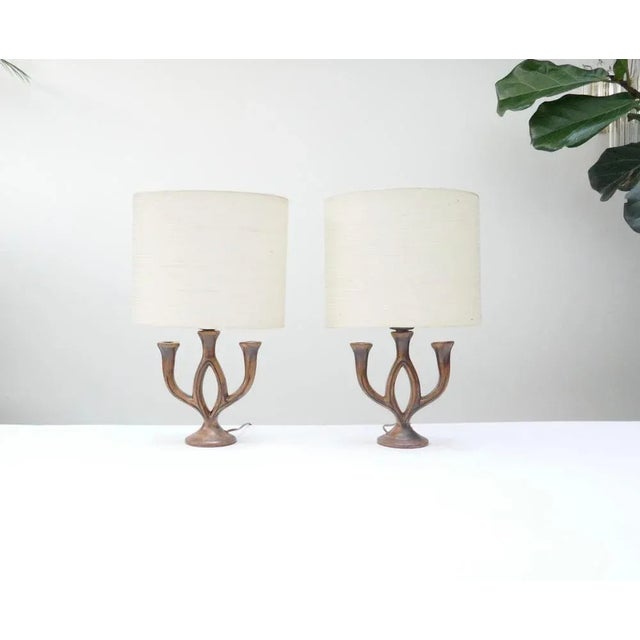 2 well sized brown table lamps in ceramics signed Les Grottes Dieulefit. Originally candleholders wired as a table lamps....