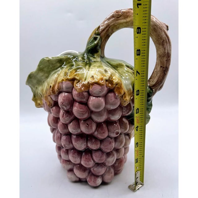 Add a touch of classic Italian charm to your home with this vintage Bassano ceramic pitcher, beautifully handpainted in...