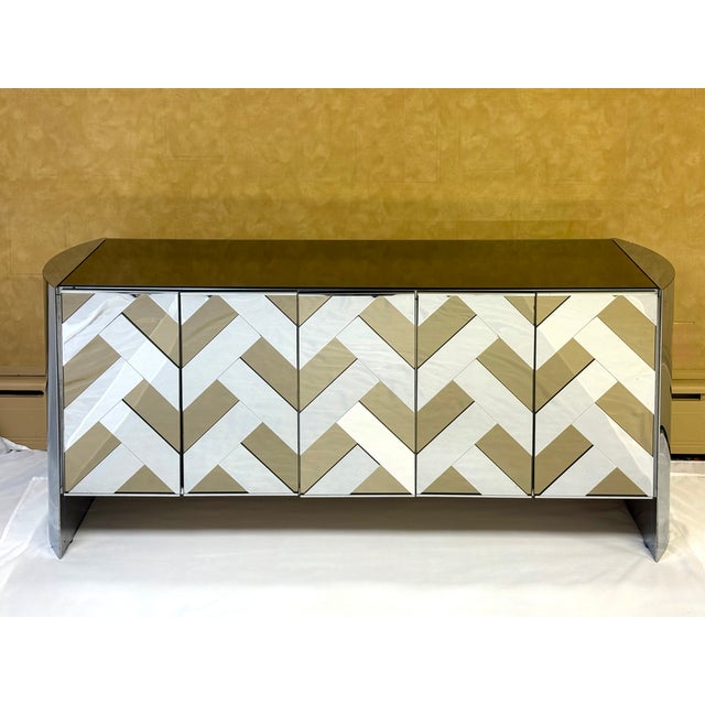Mirrored Chevron Herringbone Patterned Credenza attributed to Ello, Circa 1970's. Two tone mirror and steel exterior,...