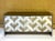 Mirrored Chevron Herringbone Patterned Credenza attributed to Ello, Circa 1970's. Two tone mirror and steel exterior,...