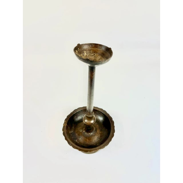 A unusual oil lamp in great condition. Oil was placed at the top with a bit of wick, while the bottom try collected any...