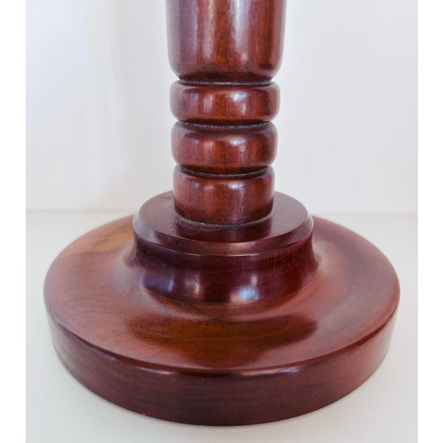 Add warmth & elegance to your space with this turned Danish candlestick pair. Beautifully crafted in walnut.