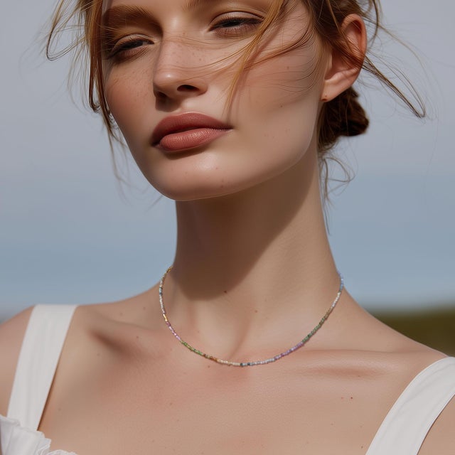 Like a secret garden worn close to your heart, this enchanting fusion of tourmaline and pearls creates a harmonious dance...