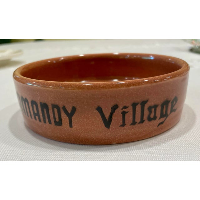 Vintage dish, wine bottle holder or ashtray from a restaurant or bar in Normandy, France. A great travel souvenir for the...