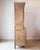 An early nineteenth-century French Norman buffet deux corps in natural solid oak. The two-part form presents four paneled...