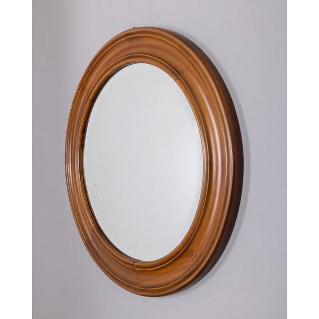 Round wall mirror with walnut frame, Italian design, 1970s.
