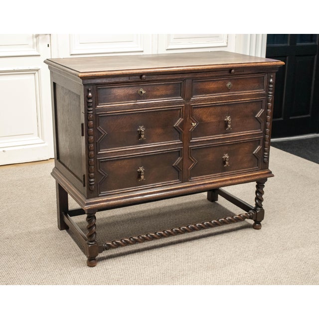 Exceptional 1920s cabinet executed in the Spanish Revival style, showcasing a refined balance between Southern European...