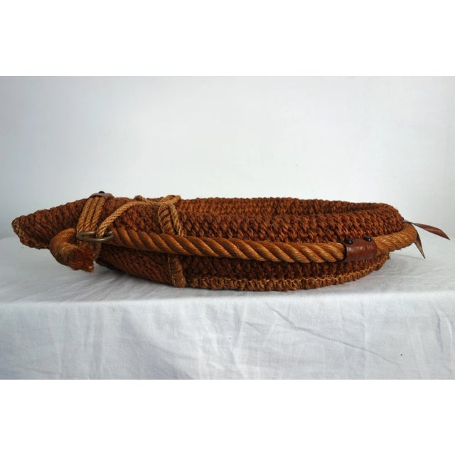 Mirror in braided rope, leather and brass decoration. True vintage 50s. Beautiful state of conservation. Dimensions 60x37...