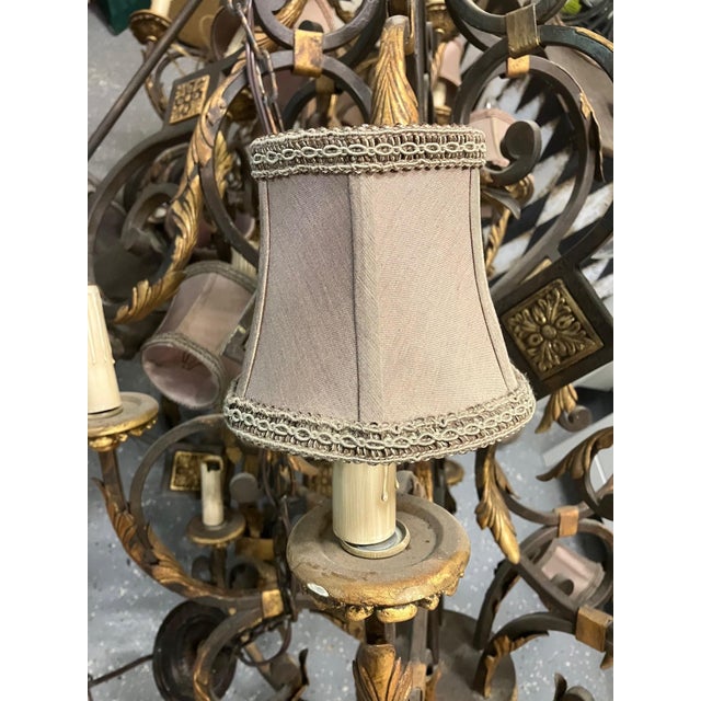 These chandeliers make a grand statement in large foyers or tall great rooms. They are two-tier, twelve-light chandeliers...