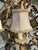 These chandeliers make a grand statement in large foyers or tall great rooms. They are two-tier, twelve-light chandeliers...
