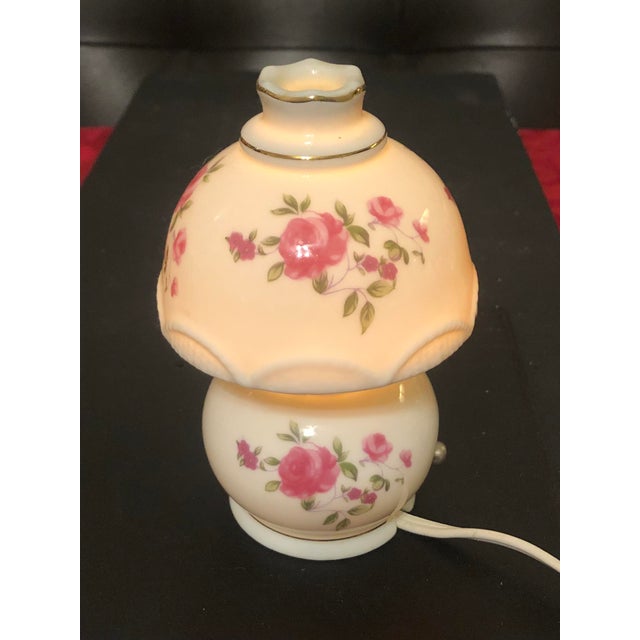 Add classic vintage charm to a nightstand, vanity, or powder room with this mid-century porcelain mini hurricane accent...