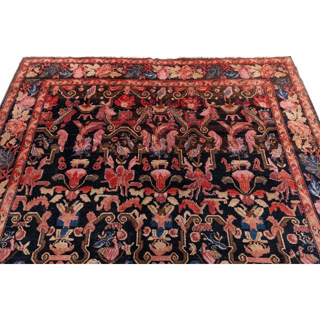 1900s Karabagh botanic brown and pink handmade wool carpet Size: 6'9" × 18'7" (205 × 566 cm) This remarkable antique...
